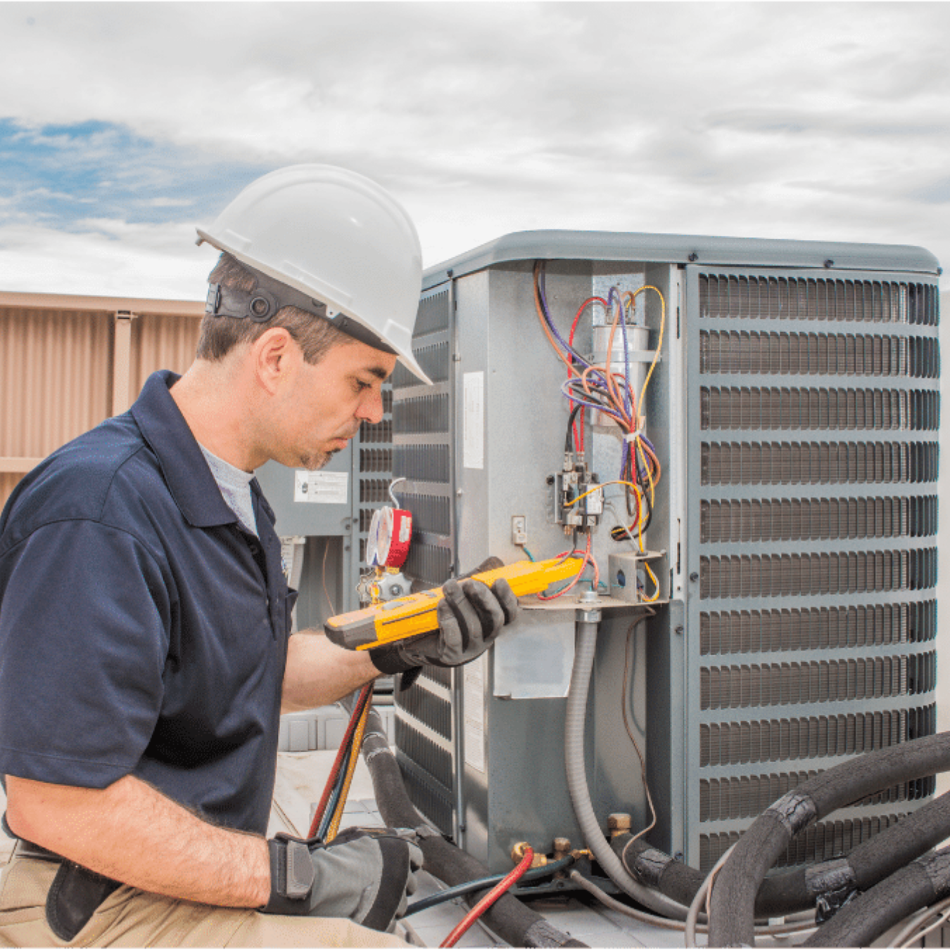Windsor HVAC Pros HVAC technician servicing a system